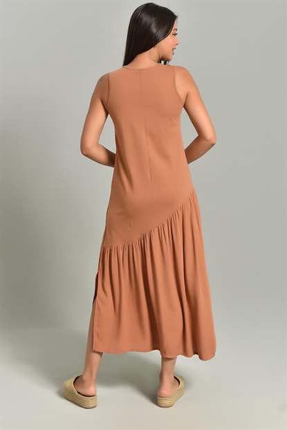 Taba Asymmetric Cut Sleeveless Dress Slit